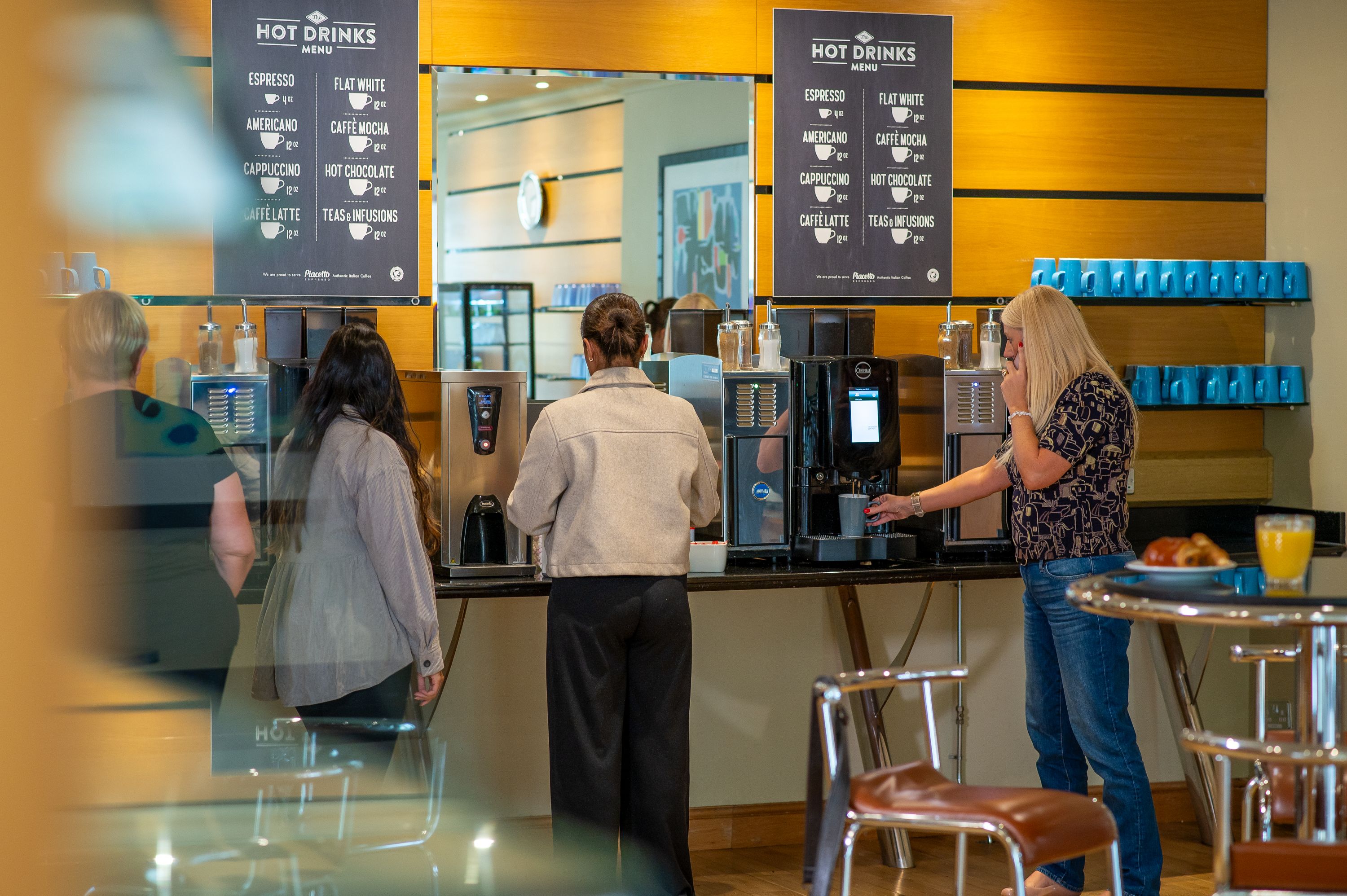 people at a coffee machine